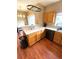 Functional kitchen space with ample countertop area and wooden cabinetry, ready for cooking at 19246 E Idaho Pl # 102, Aurora, CO 80017
