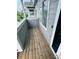 Private balcony featuring gray siding, and wood floors at 19246 E Idaho Pl # 102, Aurora, CO 80017