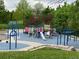 Vibrant community playground with swings, slides, and play structures at 19246 E Idaho Pl # 102, Aurora, CO 80017