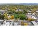 Wide aerial view showcasing the neighborhood, park, and surrounding area at 4455 Tennyson St, Denver, CO 80212