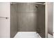 Clean bathroom with shower/tub and tile surround at 4455 Tennyson St, Denver, CO 80212