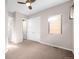 Well-lit bedroom featuring double doors to closet at 4455 Tennyson St, Denver, CO 80212