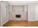 Modern linear fireplace with light gray tile surround at 4455 Tennyson St, Denver, CO 80212