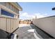 Spacious rooftop deck, offering city views and snow at 4455 Tennyson St, Denver, CO 80212