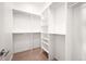 Large walk-in closet with hanging rods and shelves at 4455 Tennyson St, Denver, CO 80212