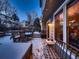 Spacious backyard deck, perfect for entertaining, with snow and outdoor seating at 17851 E Harvard Pl, Aurora, CO 80013