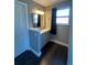 Bathroom with a new vanity, brushed nickel fixtures, and modern lighting at 15962 E Exposition Dr, Aurora, CO 80017