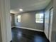 Bright bedroom with large windows and hardwood floors; lots of natural light at 15962 E Exposition Dr, Aurora, CO 80017