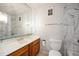 This bathroom includes marble tile, updated fixtures, and a spacious vanity at 1625 Larimer St # 605, Denver, CO 80202
