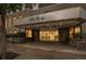 The Barclay building features stone accents, manicured landscaping, and covered entrance at 1625 Larimer St # 605, Denver, CO 80202