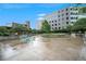 Serene courtyard featuring lush landscaping, seating areas, and a peaceful environment at 1625 Larimer St # 605, Denver, CO 80202