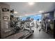 Modern fitness center featuring state-of-the-art equipment and expansive windows with city views at 1625 Larimer St # 605, Denver, CO 80202
