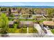Home with great curb appeal on a tree-lined street. Long driveway, mature trees in a peaceful neighborhood at 7751 S Race St, Centennial, CO 80122