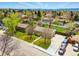Aerial view showcases the property's lush landscaping and long driveway in a beautiful neighborhood at 7751 S Race St, Centennial, CO 80122