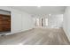 Finished basement featuring neutral carpeting, a cedar closet, and multiple doorways at 7751 S Race St, Centennial, CO 80122