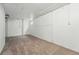 Unfinished basement area showing the carpeted floor at 7751 S Race St, Centennial, CO 80122