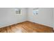 Empty bedroom featuring hardwood floors and natural light at 7751 S Race St, Centennial, CO 80122