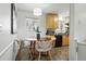 Cozy dining nook with a round table next to a well-equipped kitchen at 7751 S Race St, Centennial, CO 80122