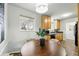 Cozy dining nook with a round table next to a well-equipped kitchen at 7751 S Race St, Centennial, CO 80122