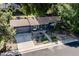 Aerial view of a single-story home boasting mature landscaping, an attached garage, and a charming curb appeal at 332 Maple Dr, Frederick, CO 80530