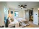Bedroom featuring a closet, ceiling fan, and a window with lots of natural light at 332 Maple Dr, Frederick, CO 80530