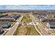 This aerial view of the neighborhood offers walking trails, central green areas, and community spaces at 4755 Memphis St # 2, Denver, CO 80239