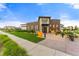 Wide shot of Clubhouse exterior, featuring a modern facade, planters, and landscaping at 4755 Memphis St # 2, Denver, CO 80239