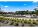 Community area featuring pergolas and stone mulch landscaping at 4755 Memphis St # 2, Denver, CO 80239