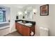 Bright bathroom featuring double sinks, sleek fixtures, and a contemporary design at 2240 N Clay St # 406, Denver, CO 80211