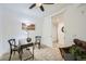 Neutral carpeted bedroom showing modern desk, ceiling fan and accent lighting at 2240 N Clay St # 406, Denver, CO 80211
