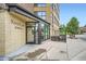 Building entrance with Riverclay Residences sign, offering stylish urban living near shops, dining, and cultural attractions at 2240 N Clay St # 406, Denver, CO 80211