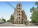 Street view of the RiverClay building showing its unique architectural design, balconies and trees at 2240 N Clay St # 406, Denver, CO 80211