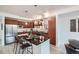 Modern kitchen with stainless steel appliances, sleek countertops, and stylish island seating at 2240 N Clay St # 406, Denver, CO 80211