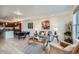 Cozy living area blending contemporary decor with an open layout to the kitchen and dining area at 2240 N Clay St # 406, Denver, CO 80211