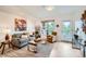 Inviting living room showcasing stylish furnishings, natural light, and outdoor access at 2240 N Clay St # 406, Denver, CO 80211