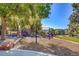 Jefferson Park playground with swings, slides, and climbing structures for to enjoy outdoor fun at 2240 N Clay St # 406, Denver, CO 80211