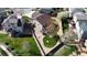 Aerial view showcasing landscaping, backyard, and neighborhood at 6079 W Prentice Ave, Littleton, CO 80123