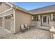Inviting front porch with stone accents, and outdoor seating, perfect for enjoying quiet mornings at 6079 W Prentice Ave, Littleton, CO 80123