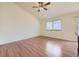 Bright living room with vaulted ceilings, hardwood floors and a view of the backyard at 6079 W Prentice Ave, Littleton, CO 80123
