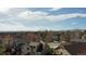 Scenic neighborhood with mature trees, varied home styles, and beautiful mountain views at 6079 W Prentice Ave, Littleton, CO 80123