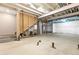 Unfinished basement ready for customization with visible utilities and concrete foundation at 821 Boulder Peak Ave, Erie, CO 80516