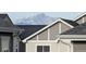 Exterior of a home with mountain views in the distance at 821 Boulder Peak Ave, Erie, CO 80516