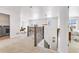 Cozy loft area with rocking horse, play tent, carpet, and bright windows, creating a welcoming space at 821 Boulder Peak Ave, Erie, CO 80516