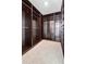 Spacious walk-in closet featuring custom shelving units and ample storage space at 821 Boulder Peak Ave, Erie, CO 80516