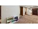 Finished basement features carpeted floors, open layout and bonus area at 2520 Eldridge Cir, Golden, CO 80401