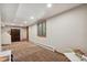 The finished basement features a cozy space, window and recessed lighting at 2520 Eldridge Cir, Golden, CO 80401