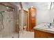 Well-appointed bathroom features a tiled shower with multiple shower heads at 2520 Eldridge Cir, Golden, CO 80401