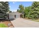 Spacious detached garage with ample parking and surrounded by mature trees at 2520 Eldridge Cir, Golden, CO 80401