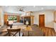 Inviting living room featuring a cozy fireplace, and access to the outdoor space at 2520 Eldridge Cir, Golden, CO 80401