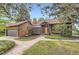 Charming front exterior showcasing a unique brick design and welcoming stone pathway at 916 W Alder St, Louisville, CO 80027
